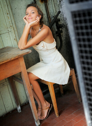 Alluring Mango A bares her sweet pussy on the chair.